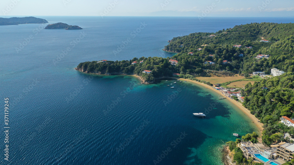 Obraz premium Aerial drone photo of famous seaside area and bay of Kanapitsa with many beautiful secluded sandy beaches, Skiathos island, Sporades, Greece