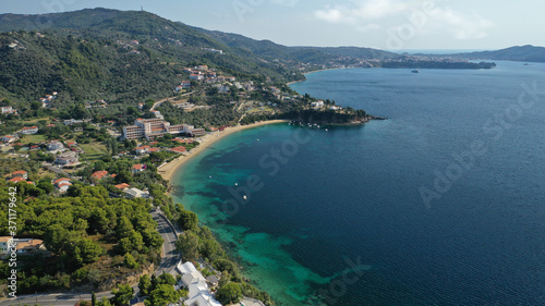 Aerial drone photo of famous seaside area and bay of Kanapitsa with many beautiful secluded sandy beaches, Skiathos island, Sporades, Greece © aerial-drone