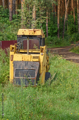 Rear view of an old abandoned front loader