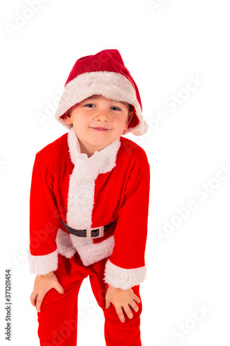 Cute little boy wearing a santa costume
