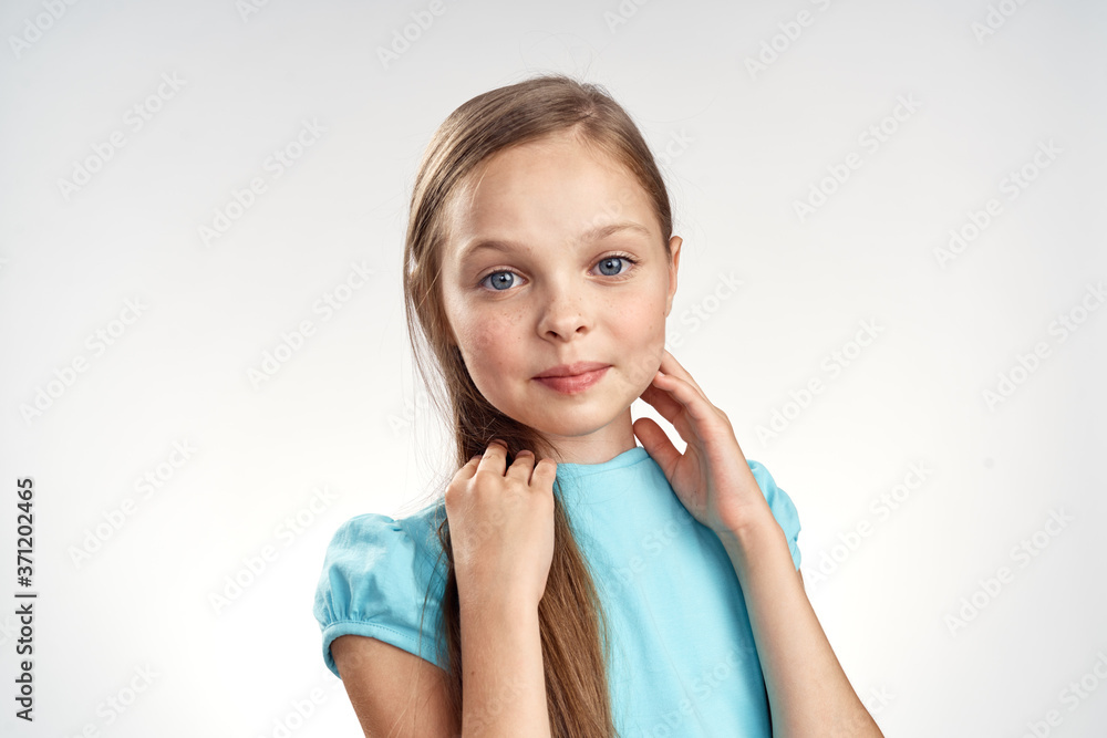 cute girl blue dresses cropped view light background emotions childhood fun cute girl blue dresses cropped view light background emotions childhood fun