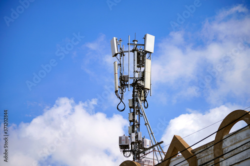 Telecommunication pole of 4G and 5G cellular. Base Station or Base Transceiver Station. 5G radio network telecommunication equipment with radio modules and smart antennas mounted on a metal.  
