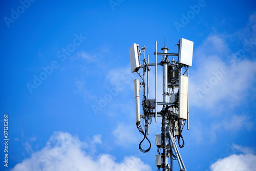 Telecommunication pole of 4G and 5G cellular. Base Station or Base Transceiver Station. 5G radio network telecommunication equipment with radio modules and smart antennas mounted on a metal.  