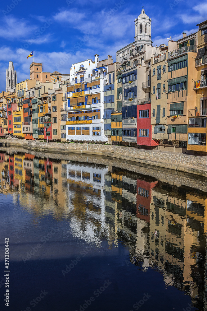 Colorful houses of Girona on the Onyar River bank. Gerona, Catalonia, Spain.