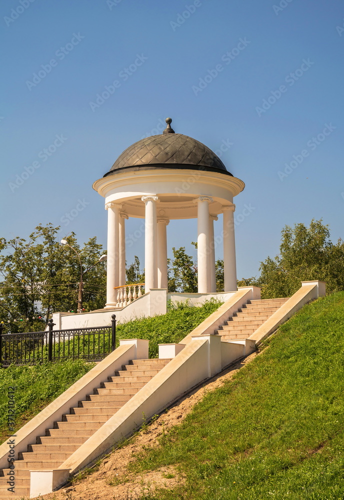 An old gazebo-rotunda on  hill on the embankment in Kostroma
