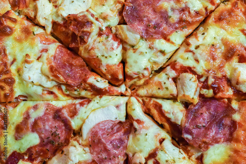 Fresh home made pizza with meats and cheese Fresh home made pizza with meats and cheese