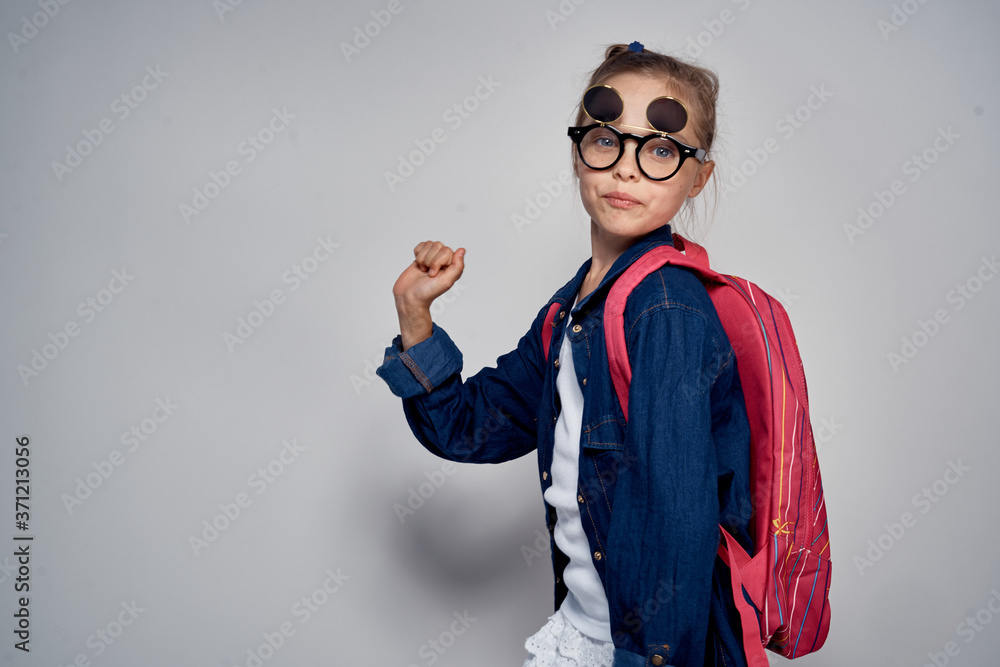 school girl with pink backpack swoosh pigtail fun learning light background school childhood school girl with pink backpack swoosh pigtail fun learning light background school childhood