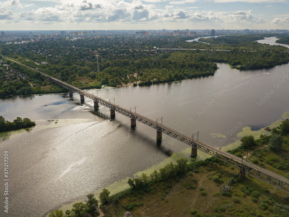 Fototapeta premium Aerial drone view. Railway bridge over the Dnieper river in Kiev.