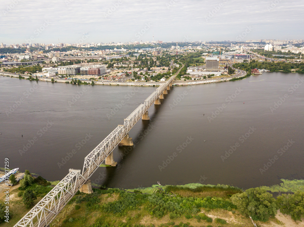 Fototapeta premium Aerial drone view. Railway bridge over the Dnieper river in Kiev.