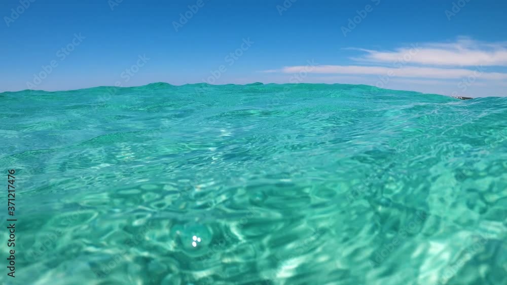 Over under view of turquoise water, Gallipoli, Ionian Sea, Italy Over under view of turquoise water, Gallipoli, Ionian Sea, Italy