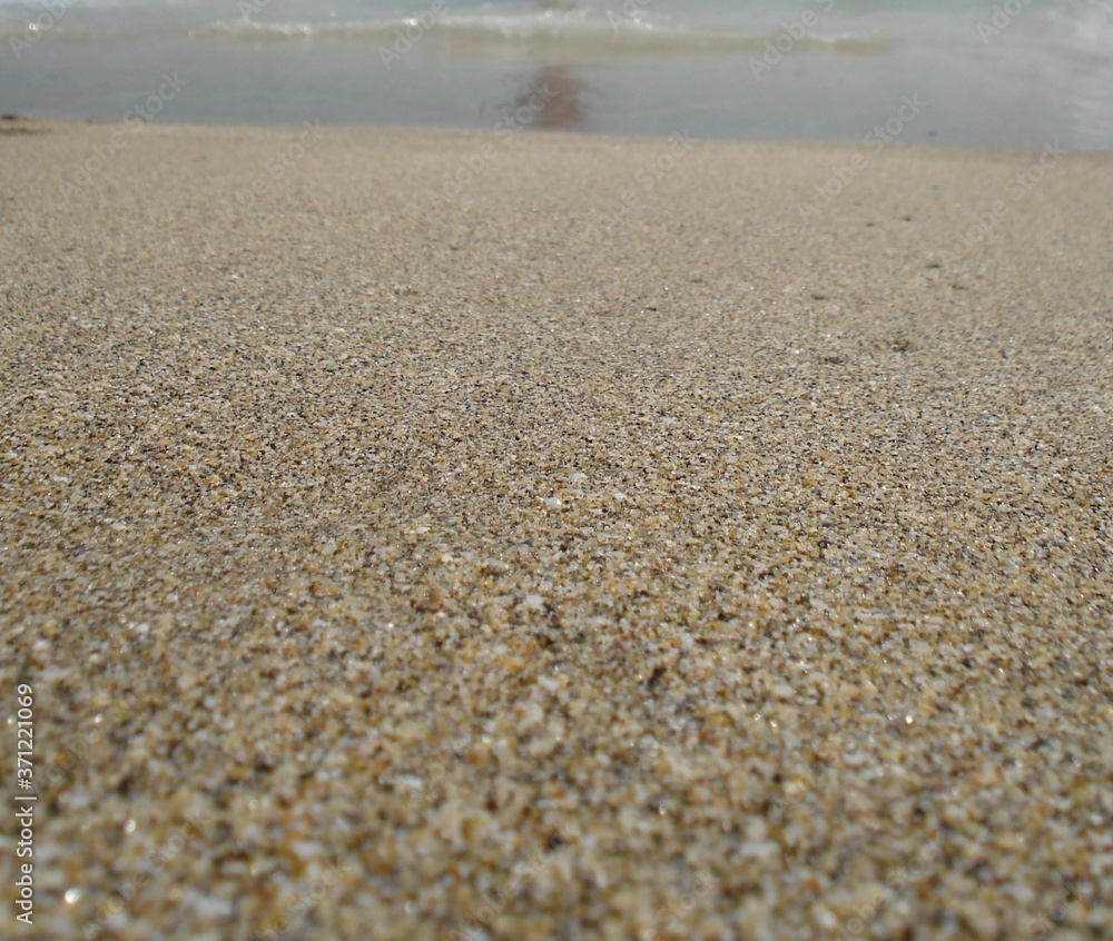 Fine sand on the beach at a shore Mediterranean sea Fine sand on the beach at a shore Mediterranean sea