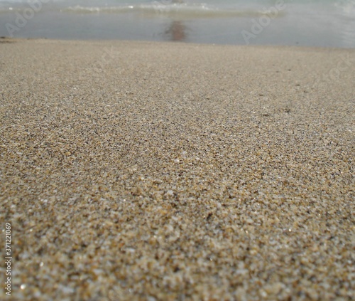 Fine sand on the beach at a shore Mediterranean sea