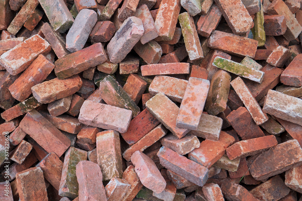 Group of bricks pile stack for building construction industrial concept or collapse destruction grunge background Group of bricks pile stack for building construction industrial concept or collapse destruction grunge background