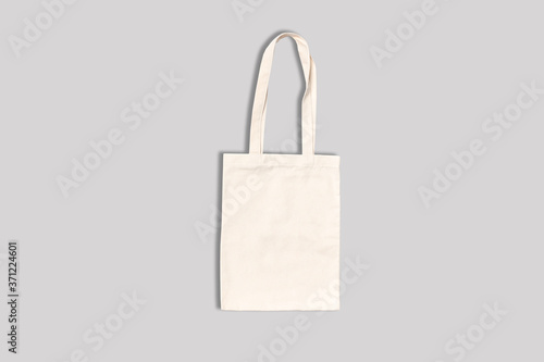 Shopping canvas or cotton bag on grey background. Mock-up for branding. 