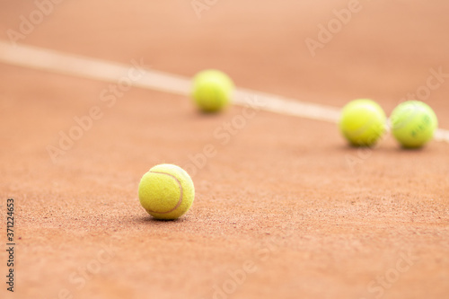 Yellow tennis balls on the court © Светлана Федоренко