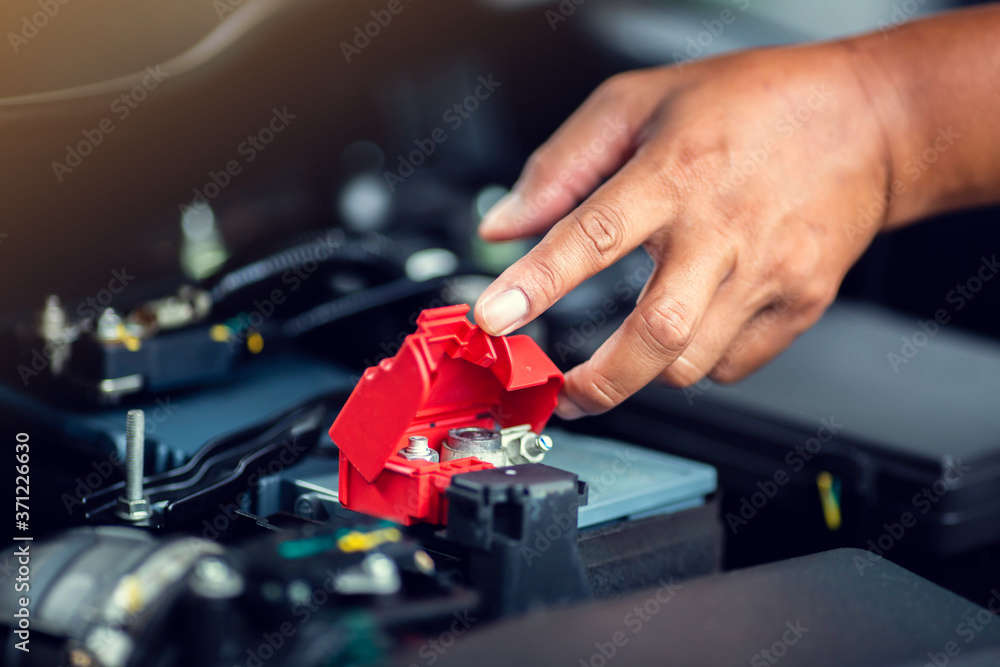 Selective focus to check and maintenance the battery in car with yourself. Service and maintenance car or vehicle. Selective focus to check and maintenance the battery in car with yourself. Service and maintenance car or vehicle.