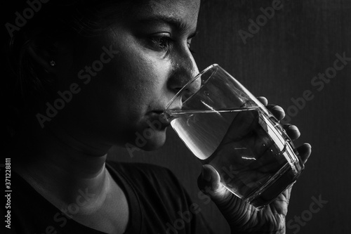 women feeling sick and taking medicines