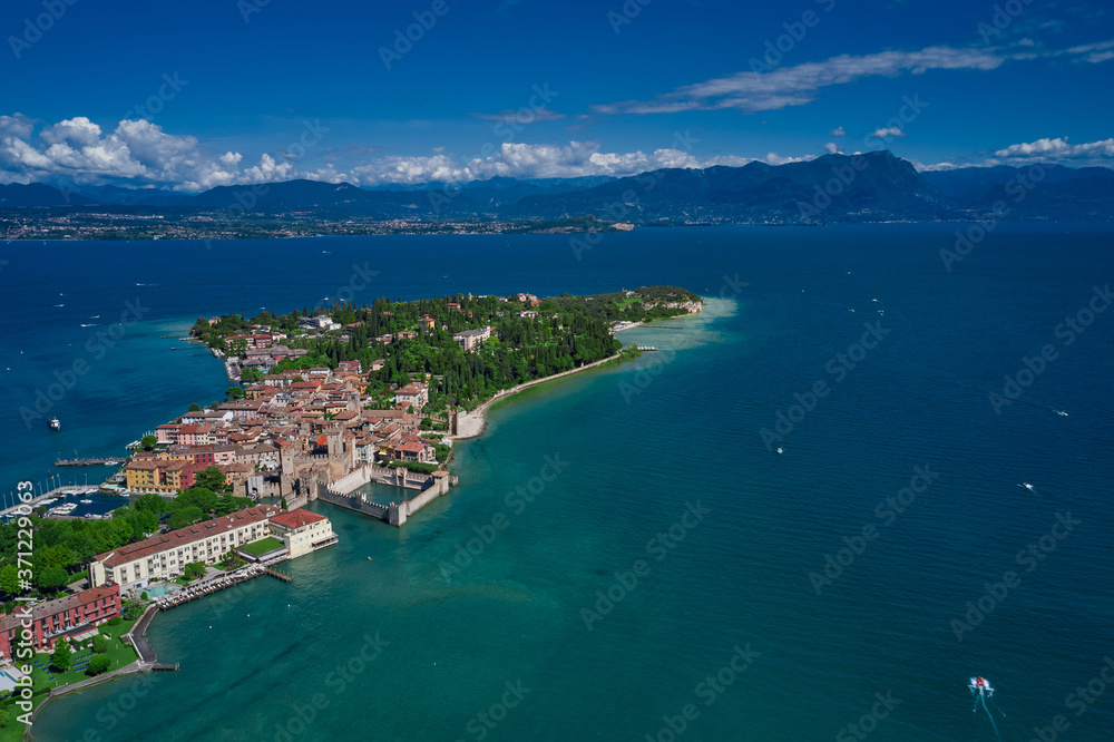 Aerial view on Sirmione sul Garda. Italy, Lombardy.View by Drone. Rocca Scaligera Castle in Sirmione.