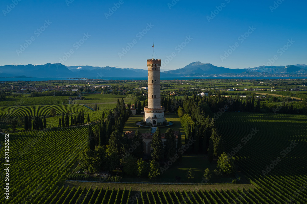 Tower of San Martino della Battaglia, Italy. Sunset. Vineyards of Italy on Lake Garda Italy. Aerial view of Lake Garda