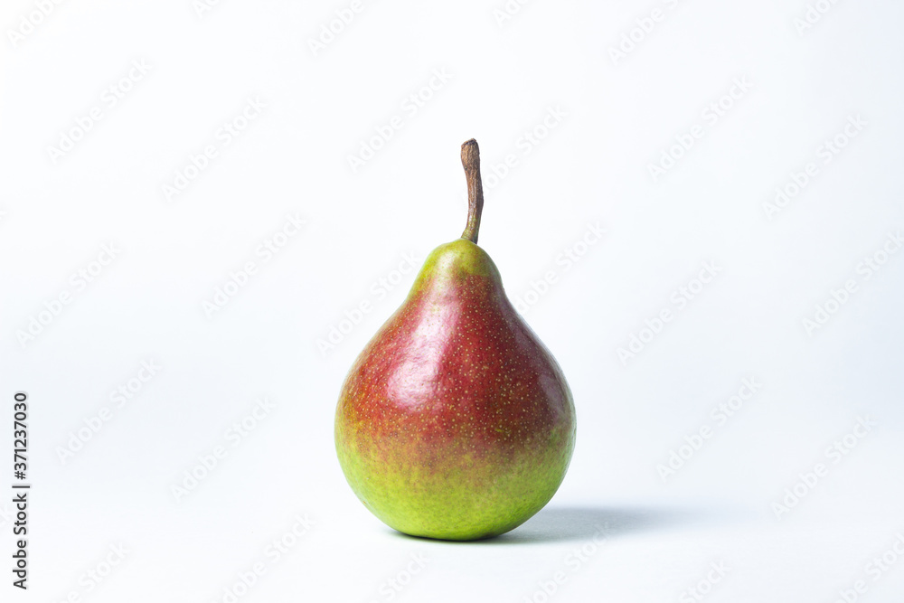 Green pear on a white background. Summer harvest. healthy fruits Green pear on a white background. Summer harvest. healthy fruits
