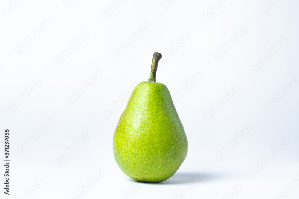 Green pear on a white background. Summer harvest. healthy fruits Green pear on a white background. Summer harvest. healthy fruits