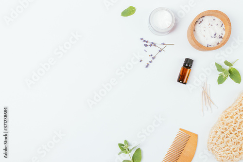 Flat lay skin care cosmetics with lavender aroma oil