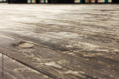 Floor tiles with the effect of wooden floors. Selective focus