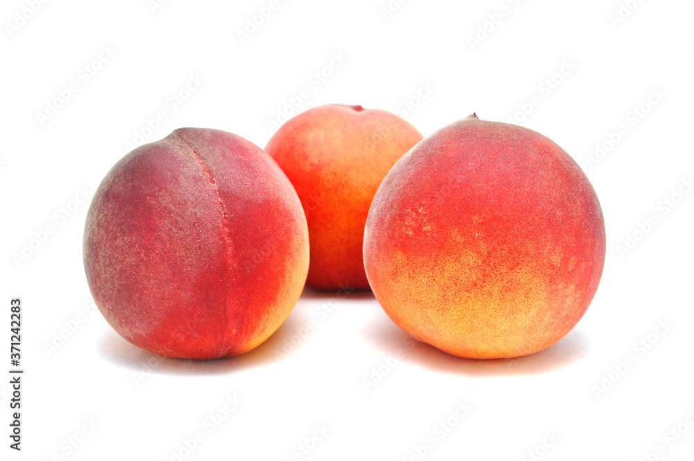 Ripe juicy peach on white background close up Ripe juicy peach on white background close up