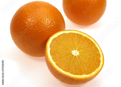 Orange  citrus sinensis  Fruits against White Background