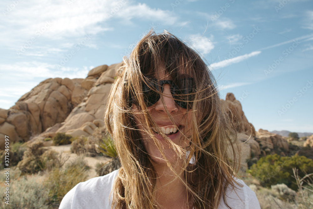 Windy haired woman in the desert Windy haired woman in the desert