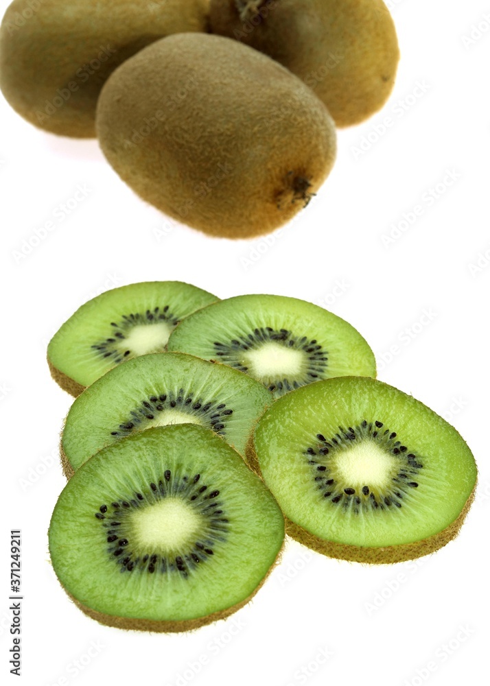 Kiwi Fruits, actinidia chinensis against White Background Kiwi Fruits, actinidia chinensis against White Background