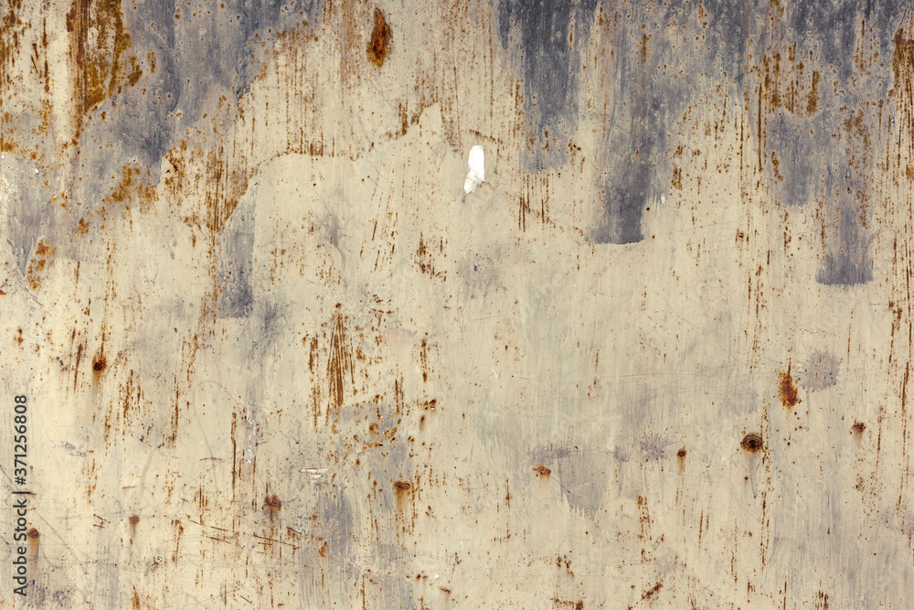 Creative bright metallic background. Flat background texture of dirty rusty metal. Bright rusty spots as the main background for a vintage scratched design Creative bright metallic background. Flat background texture of dirty rusty metal. Bright rusty spots as the main background for a vintage scratched design
