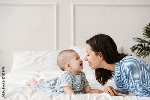 Playful Mother and her Baby having Good Time photo