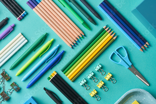 Colorful various school supplies layout