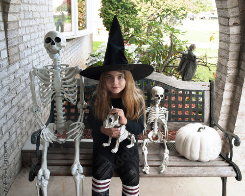 Halloween Child with Skeleton Decor Outside photo