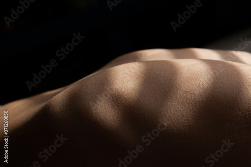 Close up of a child's chest and abdomen.