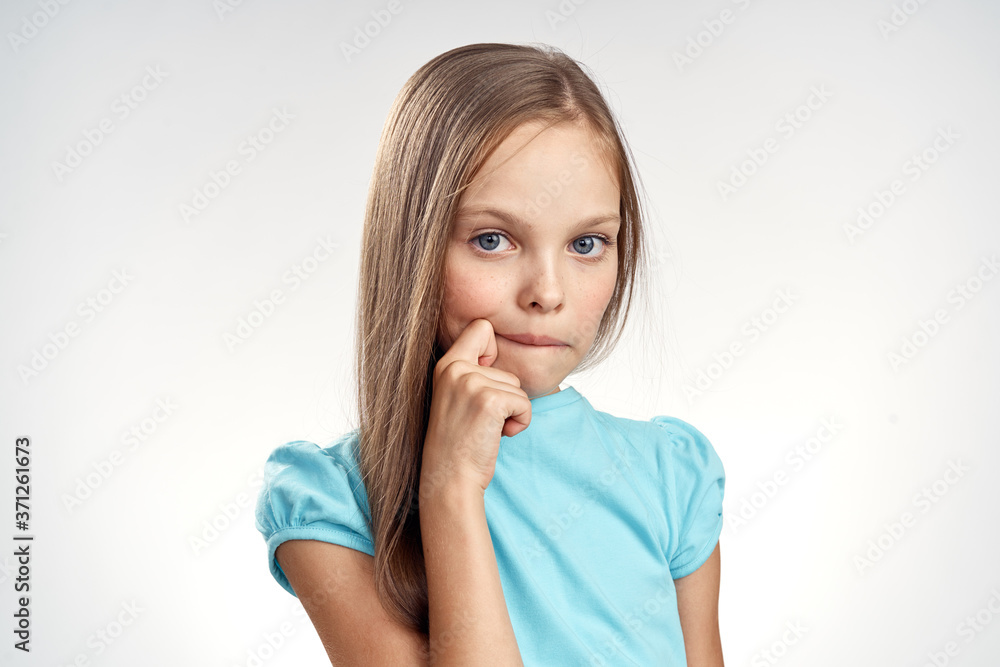 cute girl blue dresses cropped view light background emotions childhood fun cute girl blue dresses cropped view light background emotions childhood fun