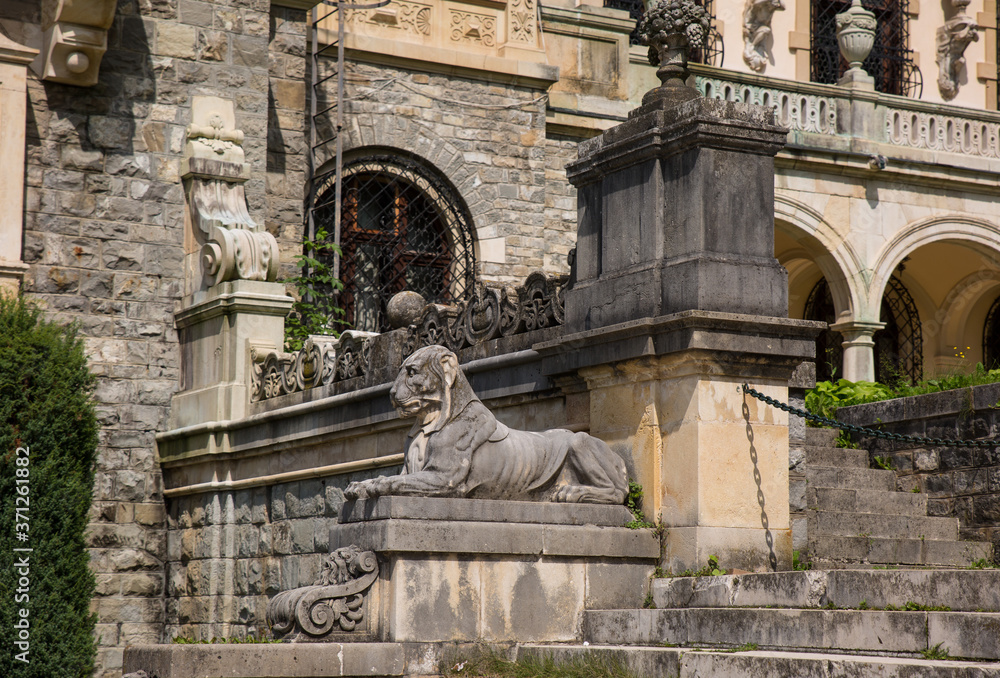 Beautiful park with marble statues in Peles castle, Sinaia, Romania