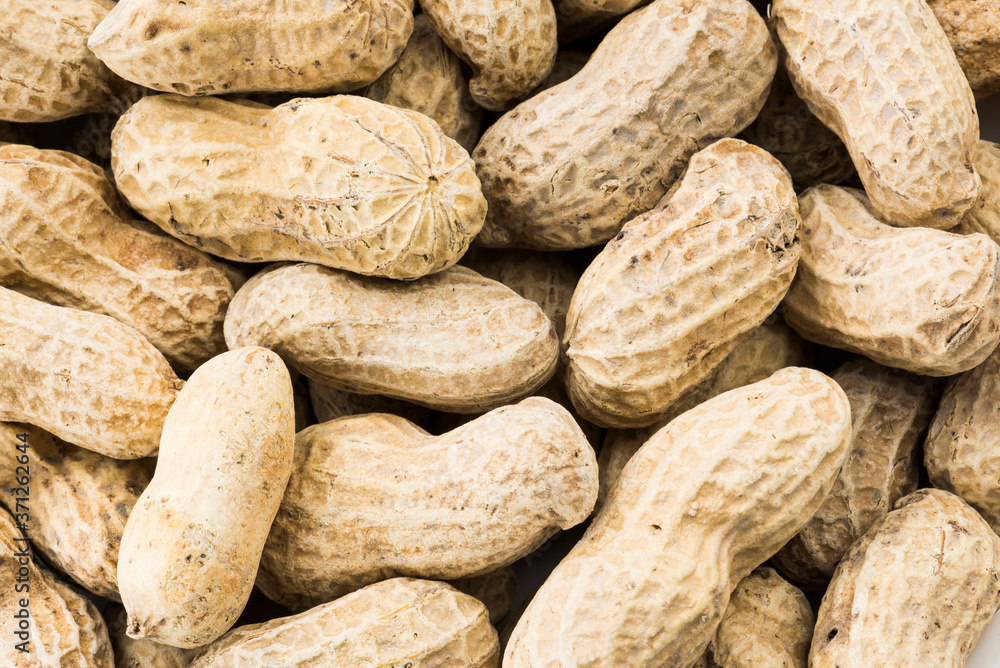 Close-up of delicious peanuts as a background Close-up of delicious peanuts as a background