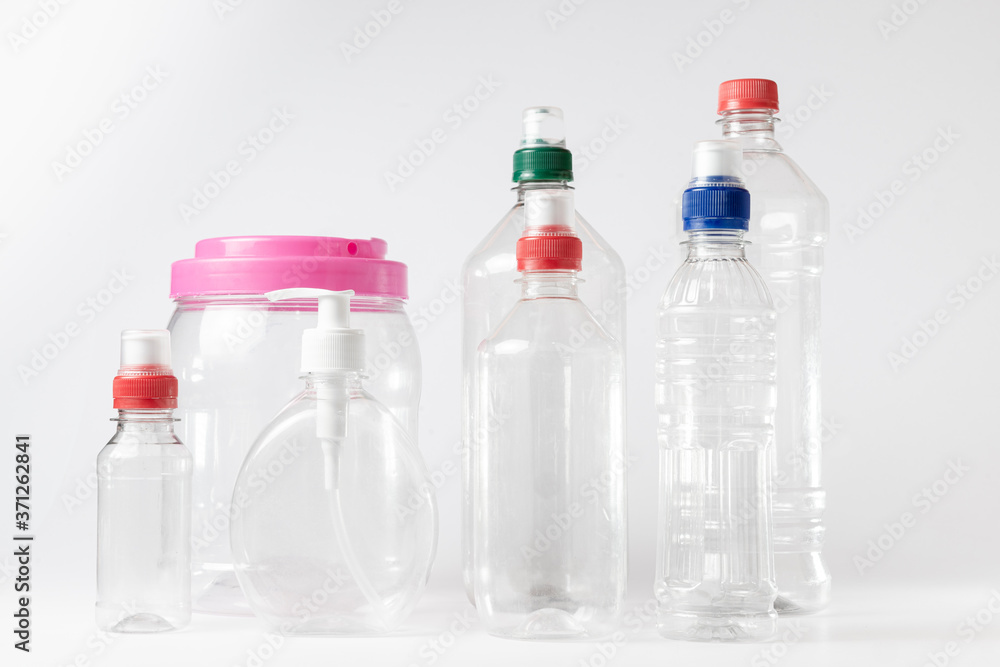 Empty plastic bottles of various sizes. White Background. Empty plastic bottles of various sizes. White Background.
