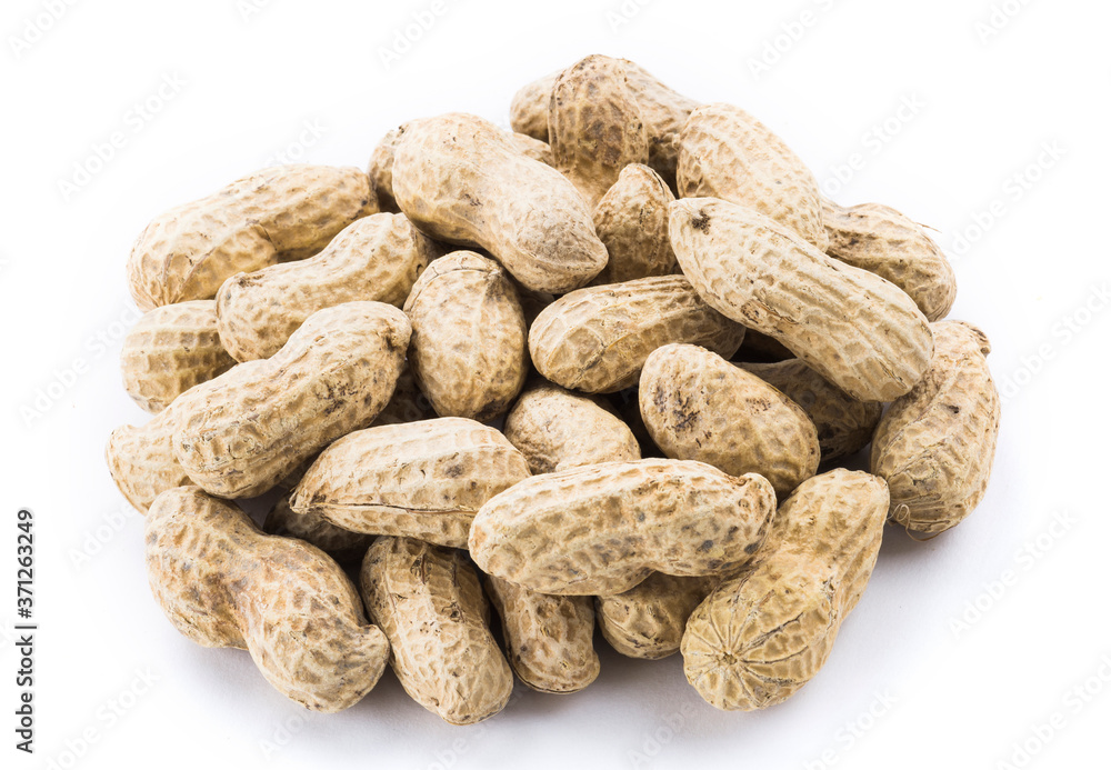 Close-up of delicious peanuts isolated on white background Close-up of delicious peanuts isolated on white background