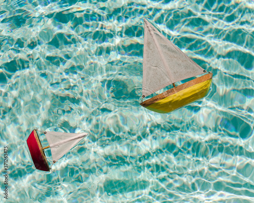 Wooden Toy Boats in Pool