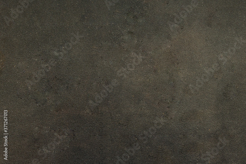 Dirty and worn skateboard grip tape. Background texture.