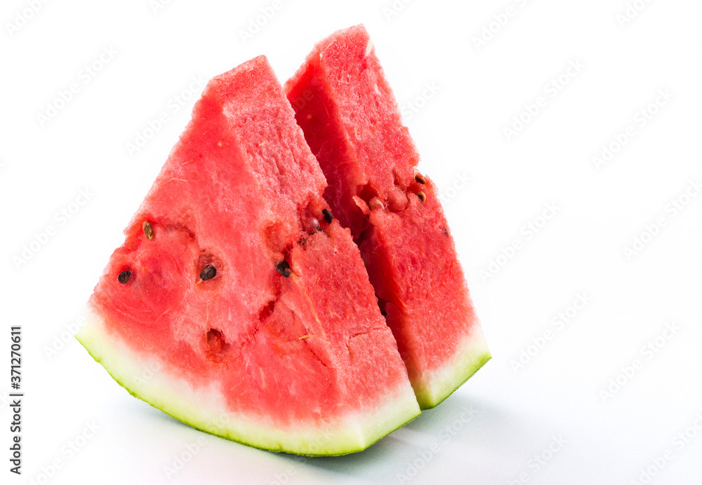 Slice of watermelon isolated on bright background Slice of watermelon isolated on bright background