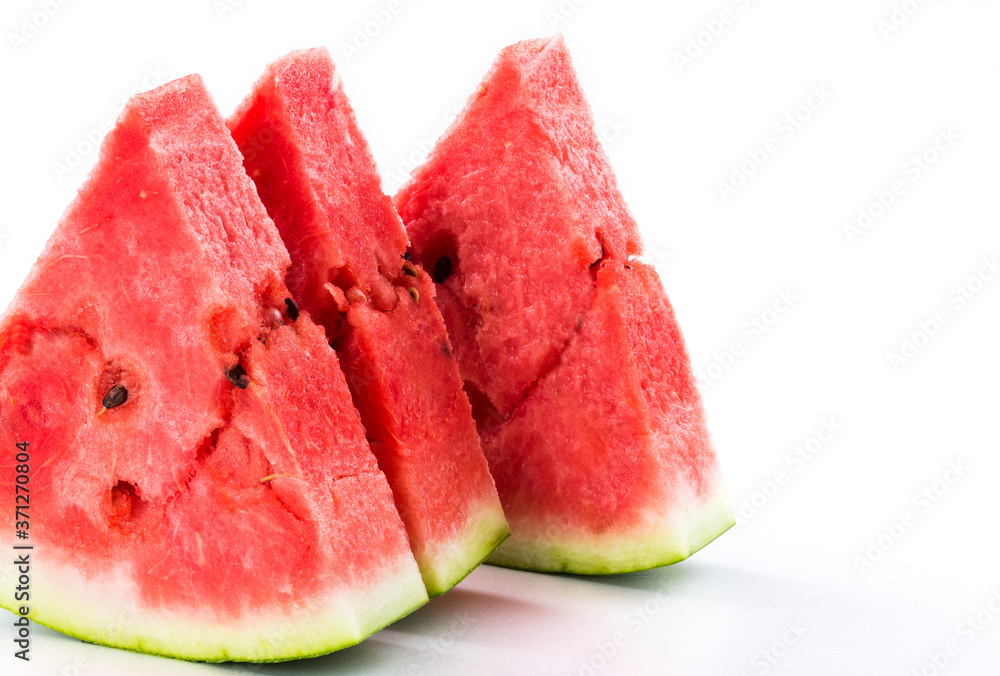 Slice of watermelon isolated on bright background Slice of watermelon isolated on bright background