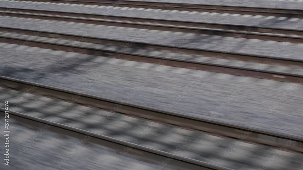 monotonous movement on the railway with a view of the rails and gray landscape, creating a peaceful atmosphere of the track monotonous movement on the railway with a view of the rails and gray landscape, creating a peaceful atmosphere of the track