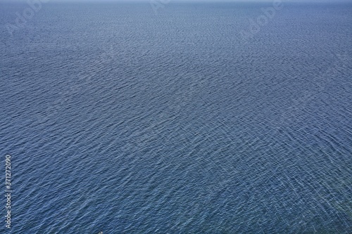 Shallow waves on the blue ocean surface