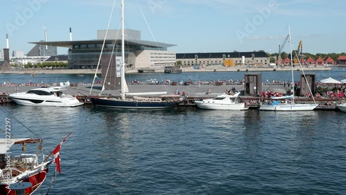 View over canals in Copenhagen with danish flag and the Royal Opera House in the background.  photo