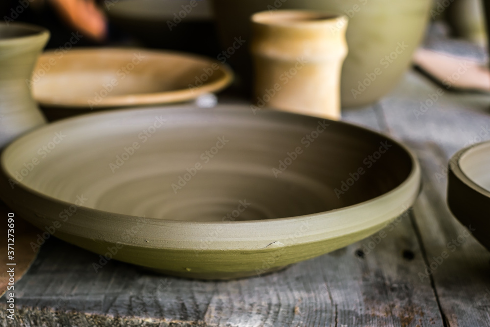 unburned clay vessels on table unburned clay vessels on table