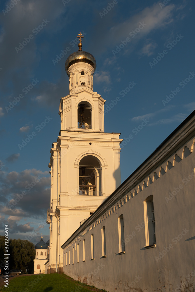 Veliky Novgorod. Yuriev Monastery. Bell tower and Holy Cross Cathedral. Summer view.Great Novgorod